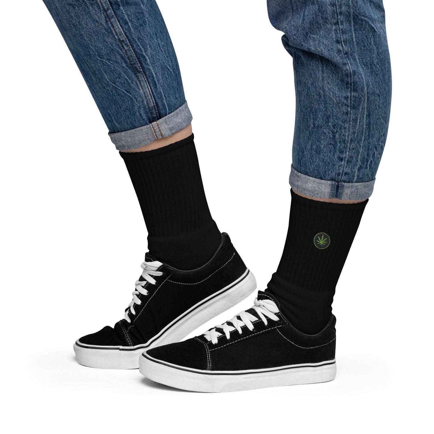 Black 420 embroidered socks with cushioned sole, paired with jeans and sneakers.