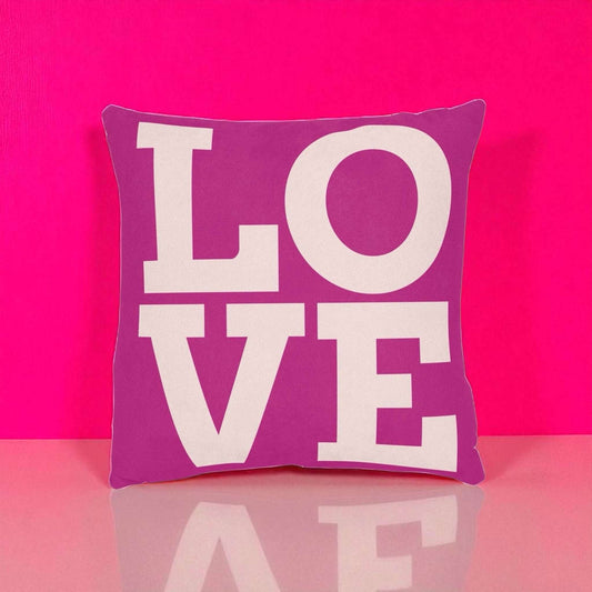 Pink Love Square Pillow with bold white block lettering on soft faux suede fabric
